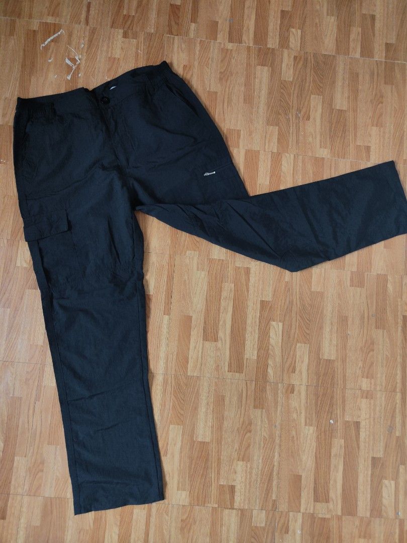 Black Nylon Multi-Pocket Cargo Utility Pants (Category: Joggers) located in San Pablo. Submitted by greatfindsspc (Listing ID 1466216453, Image 1). Description: Upgrade your streetwear or outdoor wardrobe with these highly functional black multi-pocket cargo pants. Made from a lightweight, crisp polyamide/nylon fabric, these tactical utility pants feature a comfortable partially elasticated waistband and an array of storage options, including sec