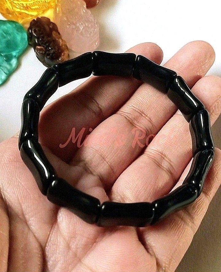 BLACK OBSIDIAN NATURAL STONE BAMBOO DESIGN SOFT BANGLE (Category: Bracelets) located in Taguig. Submitted by mimisrack (Listing ID 1466242587, Image 1). Description: 🖤Grounded strength bracelet combining protective energy with resilient symbolism -Black Obsidian is known for powerful protection and absorbing negative energy -Helps shield against negativity and emotional stress -Bamboo design symbolizes resilience, flexibility, and steady growth 
