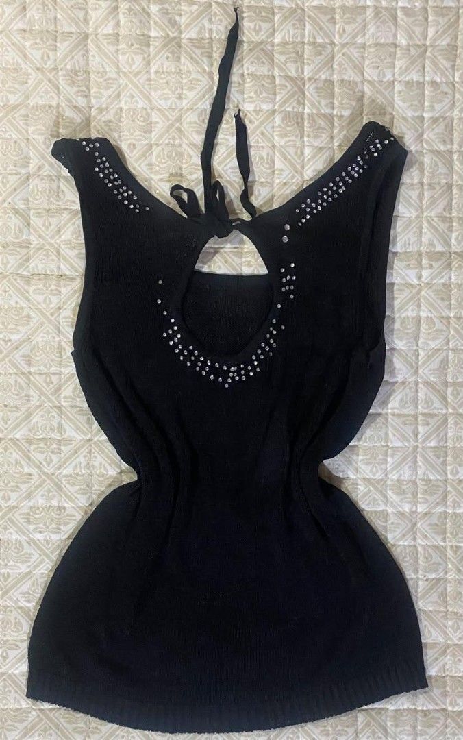 Black Rhinestone Y2K Tank Top (Category: Sleeveless) located in Pagadian. Submitted by kahtlopez47867 (Listing ID 1466278393, Image 3). Description: - Style: Y2K black knit tank top - Details: 'Take Care 70' rhinestone graphics on front - Back Design: Keyhole cutout with adjustable tie strings - Accents: Rhinestones on the straps - Fabric: Soft with slight stretch - Best for: Parties or everyday streetwear.