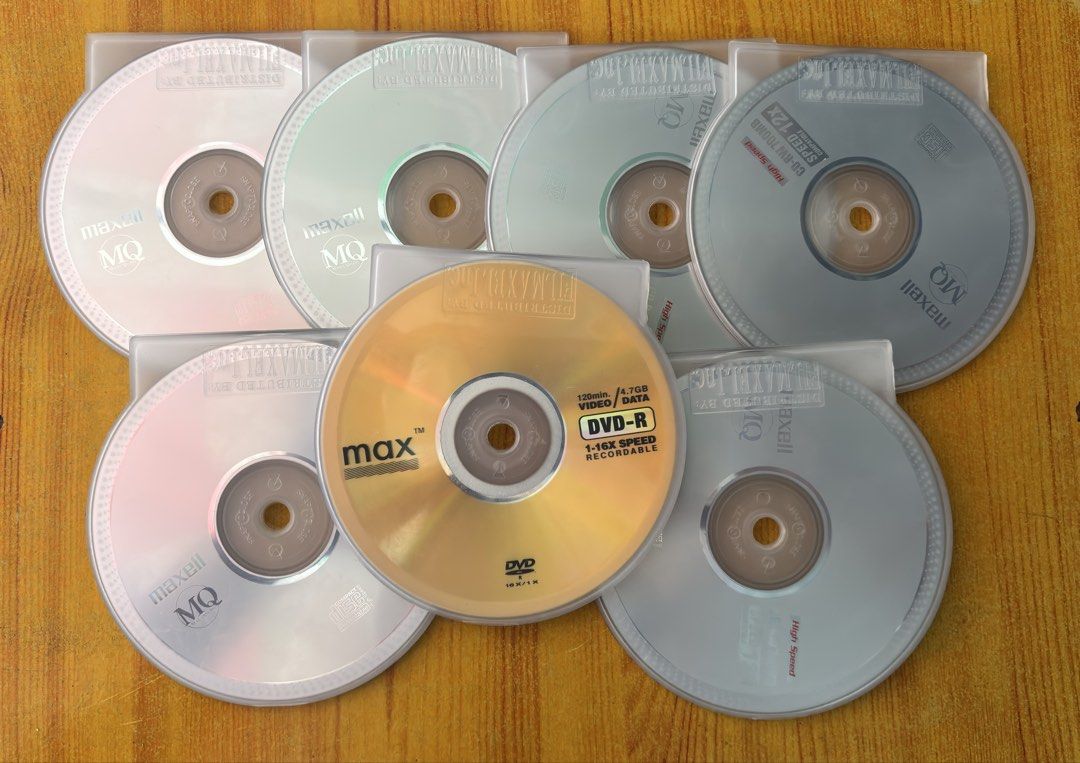 Blank Discs with Cases (Category: CDs & DVDs) located in Valenzuela. Submitted by adrianloui91976 (Listing ID 1466204934, Image 1). Description: ALL CDs ARE TESTED AND WORKING Selling a bundle of 7pcs blank vintage optical media discs. All come protected in individual clear slim plastic cases. Lot includes: • 6x Maxell MQ CD-RW (Rewritable): 700MB / 80 Min / 12x speed. Can be erased and rewritten multiple times. • 1x Max DVD-R (Recordable): 4.7GB