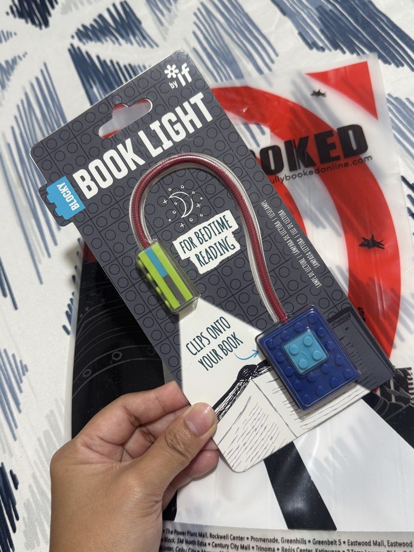 Blocky Book Light from Fullybooked (Category: Storybooks) located in Taguig. Submitted by declutterwithme620 (Listing ID 1466252369, Image 1). Description: IF Blocky Book Light / Reading Light Original price: 675pesos 🔖bought from fullybooked BGC yesterday (10/05/2026) 🔖used for like 20 mins rfs: i have another book light that i prefer shipping from bgc.