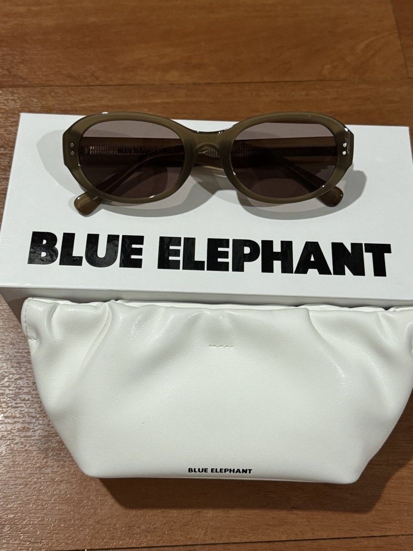Blue Elephant Garden Etoupe Sunglasses (Category: Sunglasses & Eyewear) located in Marikina City. Submitted by itemsbykat_ (Listing ID 1466180922, Image 2). Description: PRICE IS NEGOTIABLE - Colorway: Garden Etoupe with dark tinted lenses - Frame Style: Oval - Condition: Used once, completely pristine - Purchase Details: Bought from Seongsu flagship store in October 2024 - Inclusions: Original white pouch and branded box.