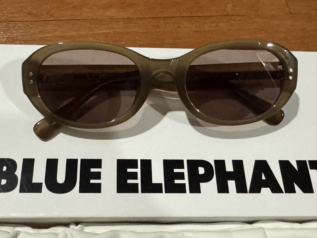 Blue Elephant Garden Etoupe Sunglasses (Category: Sunglasses & Eyewear) located in Marikina City. Submitted by itemsbykat_ (Listing ID 1466180922, Image 1). Description: PRICE IS NEGOTIABLE - Colorway: Garden Etoupe with dark tinted lenses - Frame Style: Oval - Condition: Used once, completely pristine - Purchase Details: Bought from Seongsu flagship store in October 2024 - Inclusions: Original white pouch and branded box.