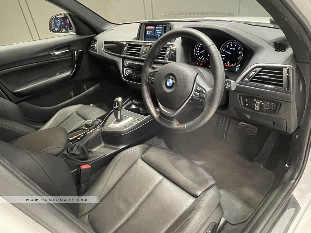 BMW 1 Series Hatchback 118i 5-door Edition Sport (A) (Category: Used Cars) located in Singapore. Submitted by sandycastle (Listing ID 1466308785, Image 2). Description: This is the newer F20 B38 LCI Model, with RWD. Excellent Condition and no accidents. Upgraded to 18" Black Rims, with Brand New Fresh Michelin PS5s tires just installed last month (less than 1k Km). Upgraded with Black spoilers, Side Mirrors, and M-Sport Steering wheel. Bought fro
