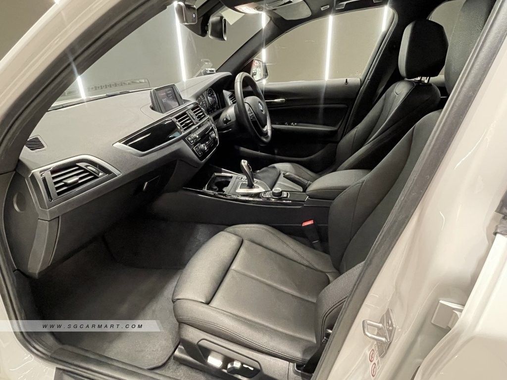 BMW 1 Series Hatchback 118i 5-door Edition Sport (A) (Category: Used Cars) located in Singapore. Submitted by sandycastle (Listing ID 1466308785, Image 3). Description: This is the newer F20 B38 LCI Model, with RWD. Excellent Condition and no accidents. Upgraded to 18" Black Rims, with Brand New Fresh Michelin PS5s tires just installed last month (less than 1k Km). Upgraded with Black spoilers, Side Mirrors, and M-Sport Steering wheel. Bought fro