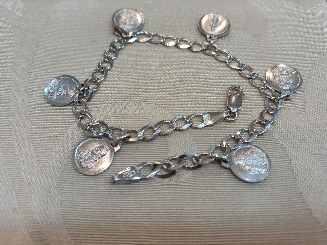 Bracelet medal (Category: Bracelets) located in Makati City. Submitted by divinejewels.ph (Listing ID 1466221366, Image 1). Description: GFM-730 BRACE 6 MEDALS CHARM 14KWG 9.03GRAMS 7 5'.