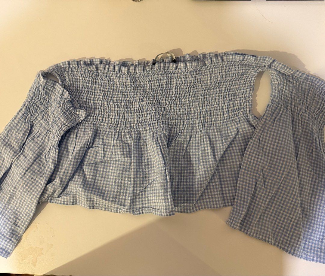Brandy Melville Gingham Off shoulder Top (Category: Others Tops) located in Binan City. Submitted by bykkd (Listing ID 1466222432, Image 1). Description: .