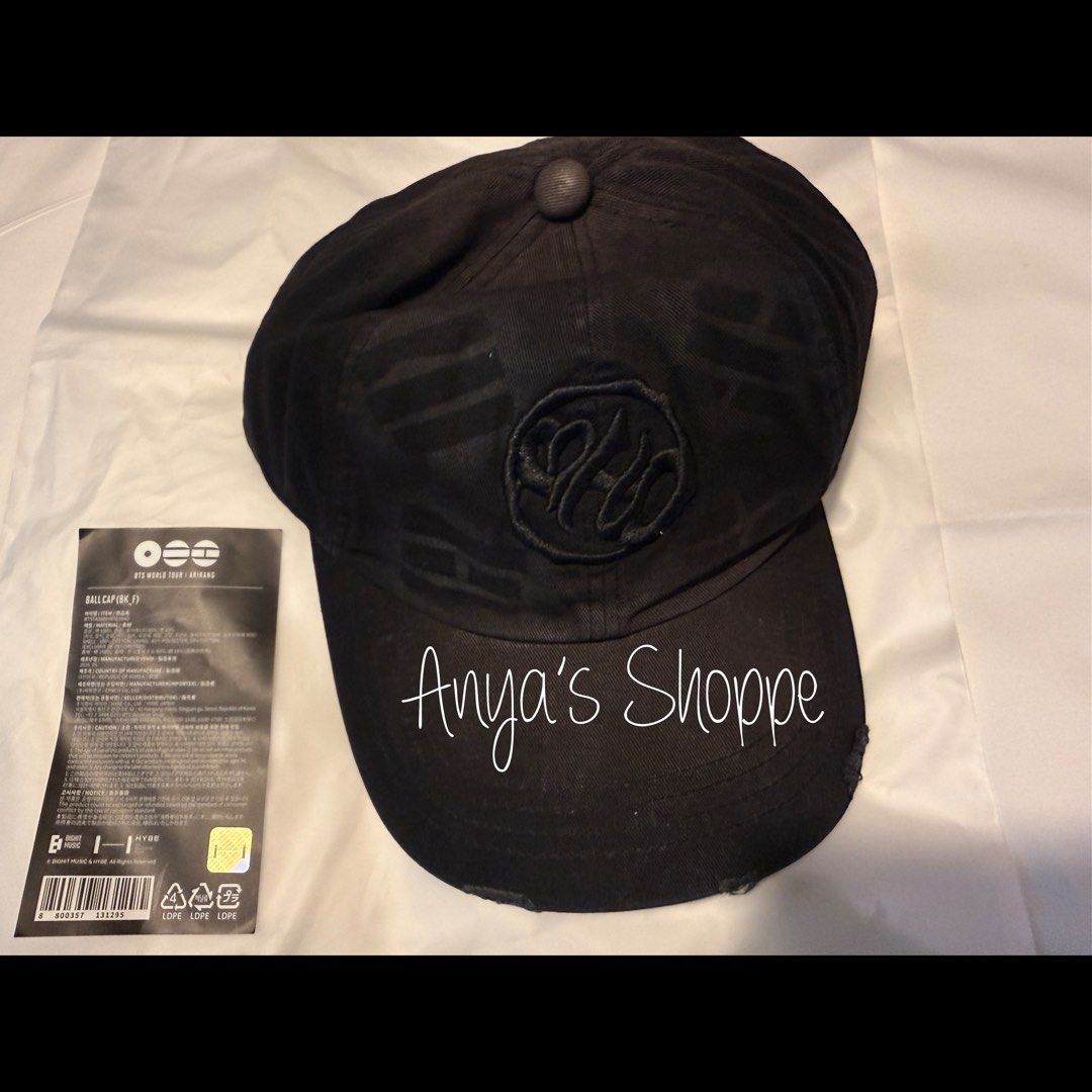BTS World Tour Arirang Ball Cap (Black) (Category: Caps & Hats) located in Paranaque City. Submitted by anyasshoppe (Listing ID 1466330109, Image 2). Description: - Official BTS World Tour Arirang merchandise - Color: Classic black - Size: Free size with an adjustable metal strap for a custom fit - Details: Stitched front embroidery and trendy distressed brim - Condition: Brand new with original packaging bag and tag included - Perfect for ARMY c