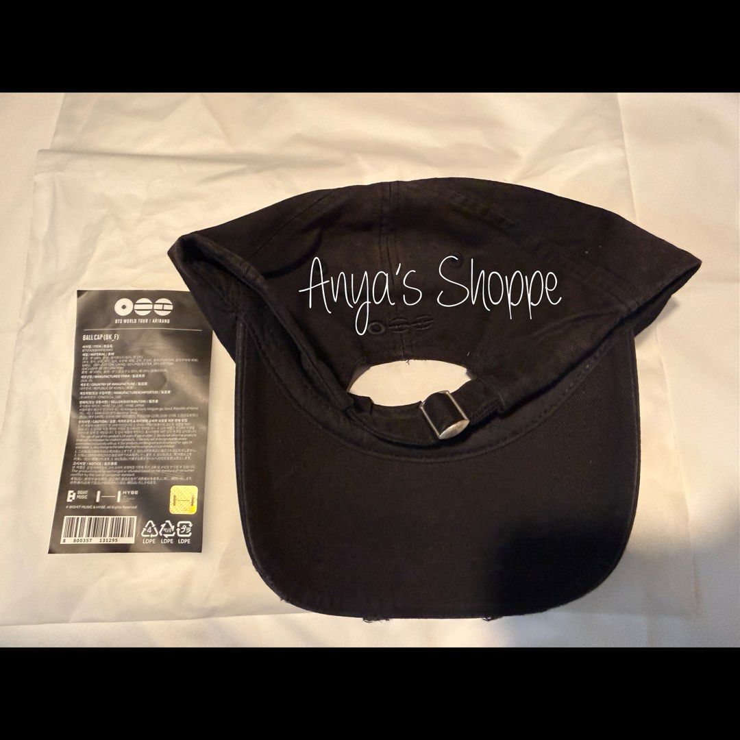 BTS World Tour Arirang Ball Cap (Black) (Category: Caps & Hats) located in Paranaque City. Submitted by anyasshoppe (Listing ID 1466330109, Image 3). Description: - Official BTS World Tour Arirang merchandise - Color: Classic black - Size: Free size with an adjustable metal strap for a custom fit - Details: Stitched front embroidery and trendy distressed brim - Condition: Brand new with original packaging bag and tag included - Perfect for ARMY c
