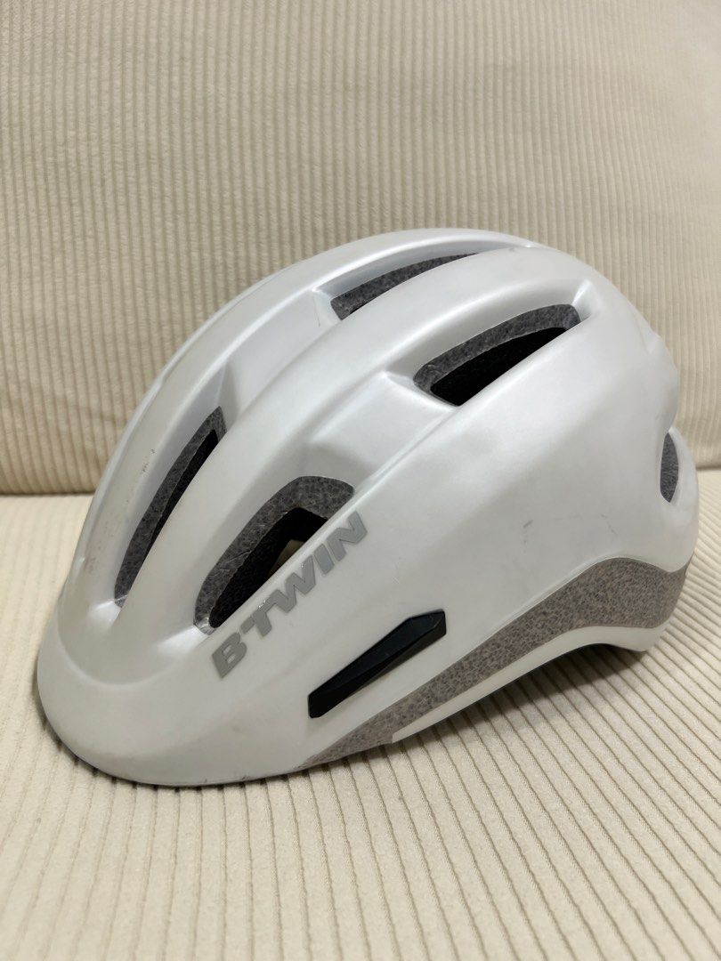 BTWIN Cycling Helmet (Category: Bicycles) located in Pasig City. Submitted by patting18 (Listing ID 1466229704, Image 1). Description: Model: City Cycling 500 Size: Medium Bought from Decathlon Rarely used Strap needs cleaning Without scratches but with some markings (see photos) Freebies: Rockbros cap and helmet back light.