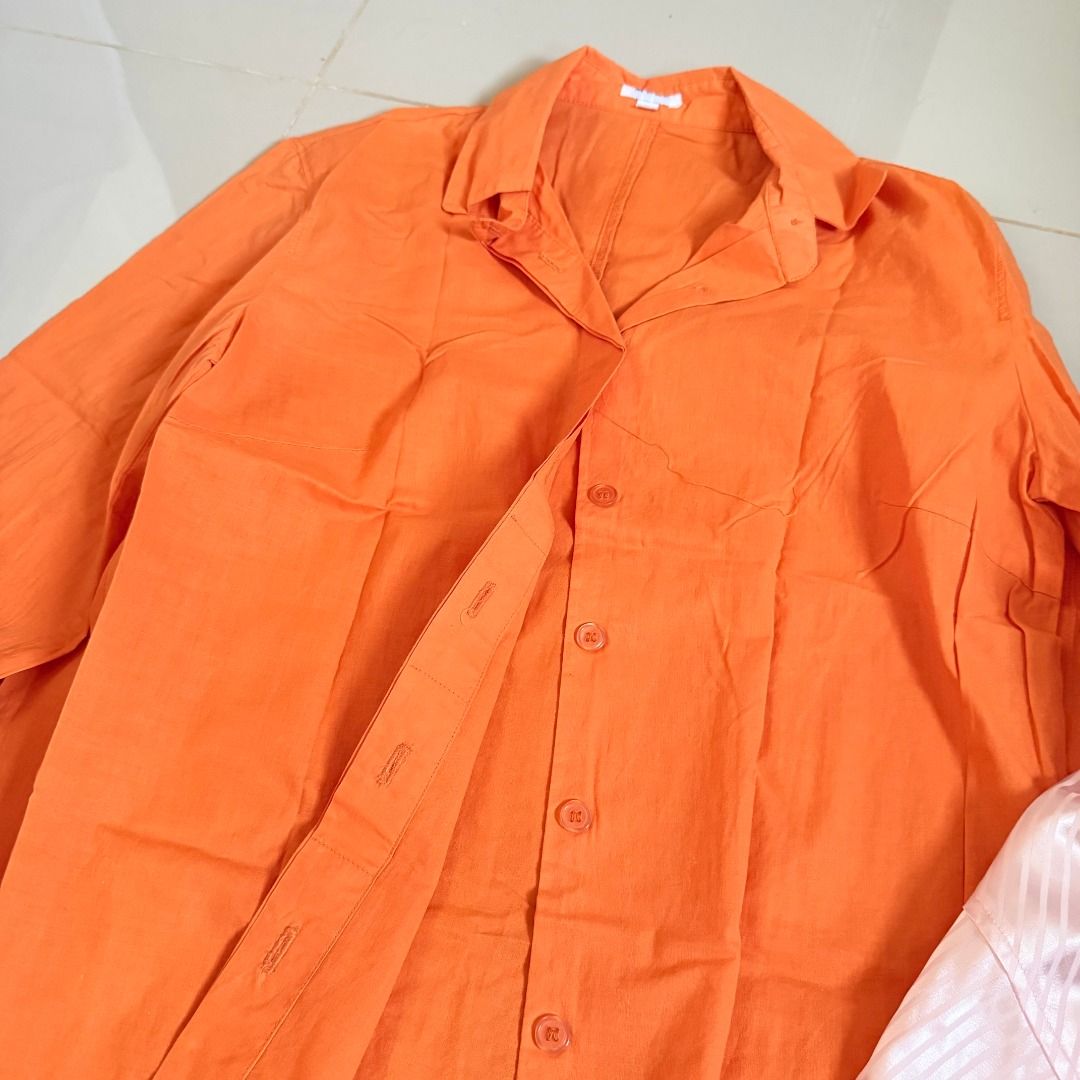 Bundle of 2: Button Down Long Sleeves Polo (Category: Blouses) located in Baliuag. Submitted by dubu.preloved (Listing ID 1466276574, Image 2). Description: Bundle of 2: Button Down Long Sleeves Polo (Orange and Striped Pink) ✨ Condition: 7/10 📏 Size: S 🚚 Shipping available via JNT/Flash 📍 Meet-up: Baliuag, Bulacan.