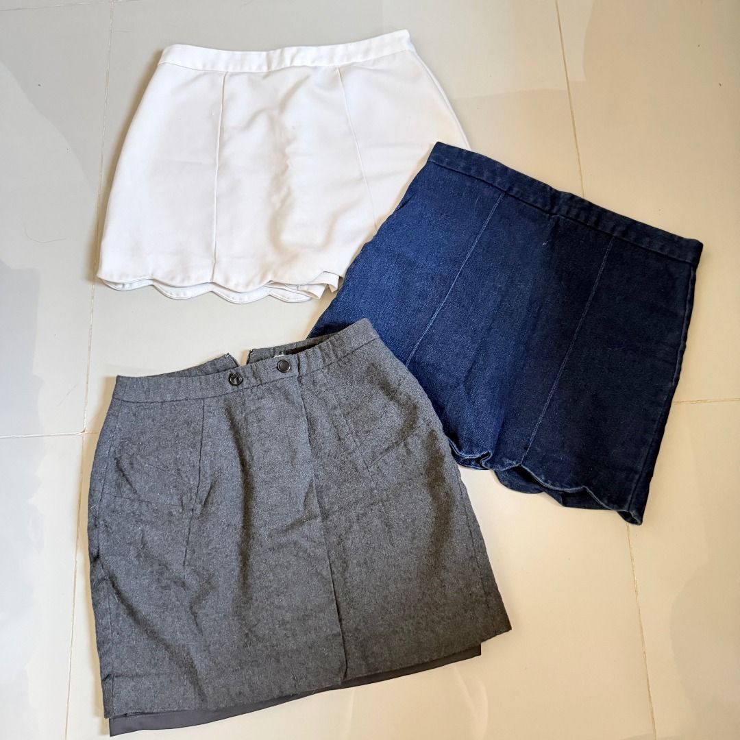 Bundle of 3: Mini Skirts (Category: Skirts) located in Baliuag. Submitted by dubu.preloved (Listing ID 1466270759, Image 1). Description: White, Denim, and Gray Skirts Bundle - Good for Office Wear! - With Shorts Lining (White & Denim) ✨ Conditions: 9/10 📏 Waistline: 24-26 🚚 Shipping available via JNT/Flash 📍 Meet-up: Baliuag, Bulacan.