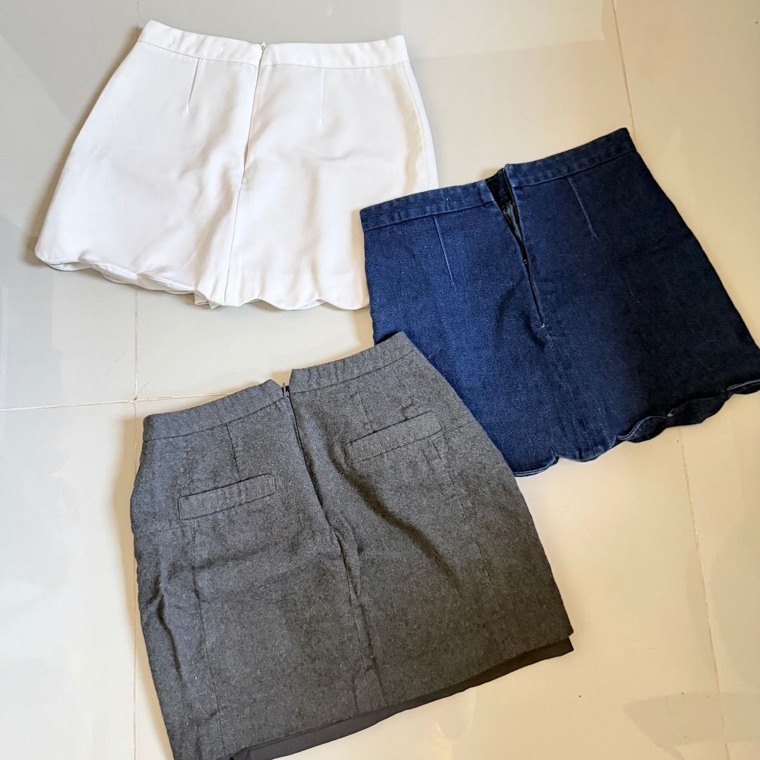 Bundle of 3: Mini Skirts (Category: Skirts) located in Baliuag. Submitted by dubu.preloved (Listing ID 1466270759, Image 3). Description: White, Denim, and Gray Skirts Bundle - Good for Office Wear! - With Shorts Lining (White & Denim) ✨ Conditions: 9/10 📏 Waistline: 24-26 🚚 Shipping available via JNT/Flash 📍 Meet-up: Baliuag, Bulacan.