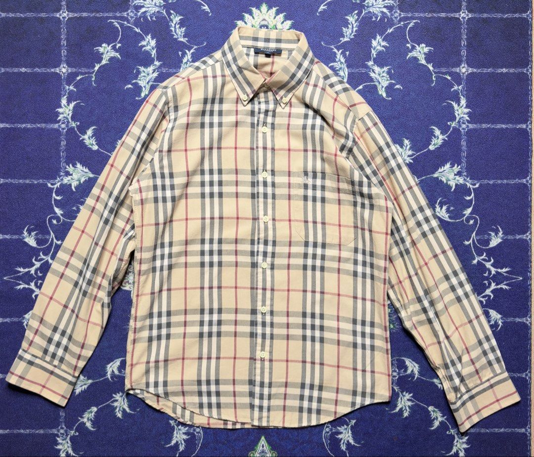 Burberry Plaid Polo LS (Category: Luxury Apparel) located in Valenzuela. Submitted by telagram (Listing ID 1466239728, Image 1). Description: .