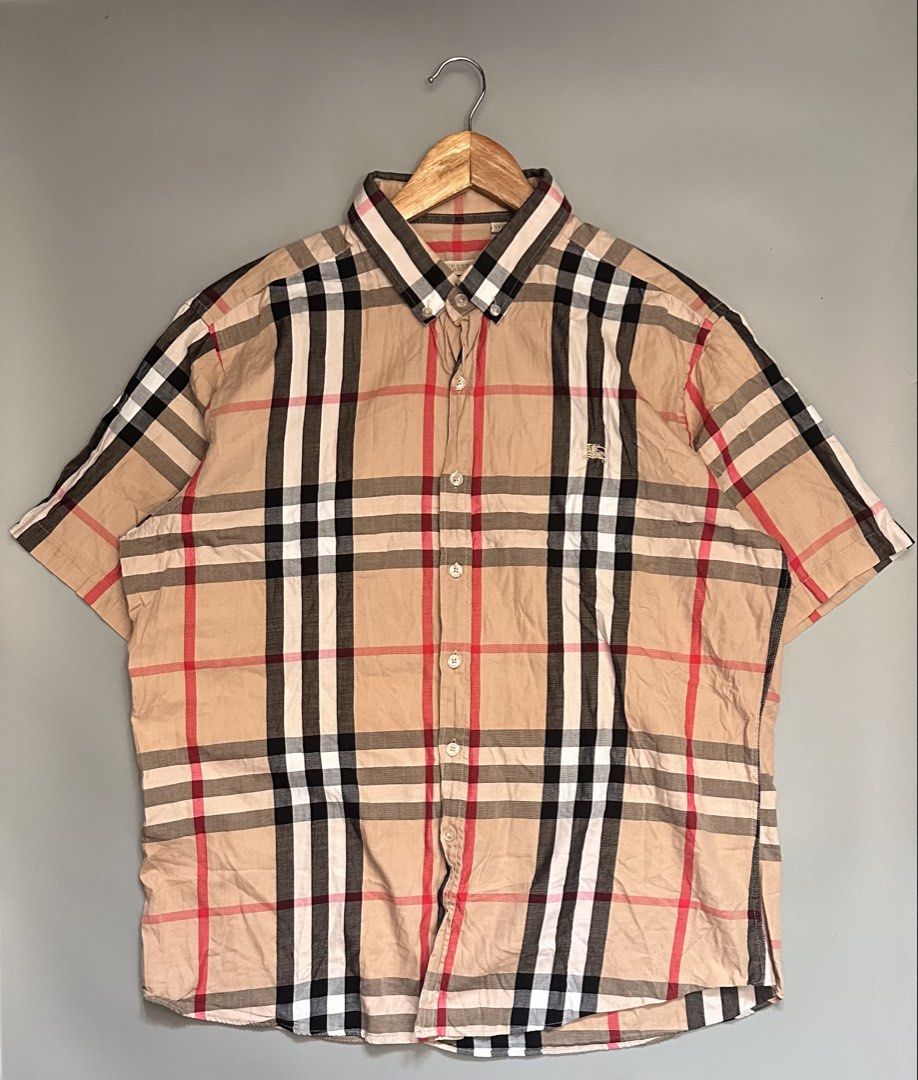 Burberry Polo Button Down (Category: Activewear) located in Manila. Submitted by thriftavenueph (Listing ID 1466167138, Image 1). Description: Fs: Burberry Polo Button Down Size: 24x28, XL Condition: excellent, no issue, 10/10 color Price: 1,500.