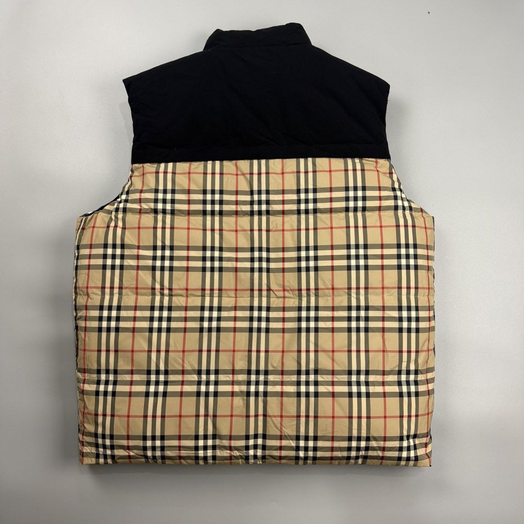 Burberry Reversible Check Puffer Vest (Category: Vests) located in Cavite. Submitted by epiboie (Listing ID 1466191434, Image 3). Description: Burberry reversible puffer jacket Size medium( kasya pa hangang large frame) 25x28 Color rate: 9.5/10 excellent condition No issue 3180 -.