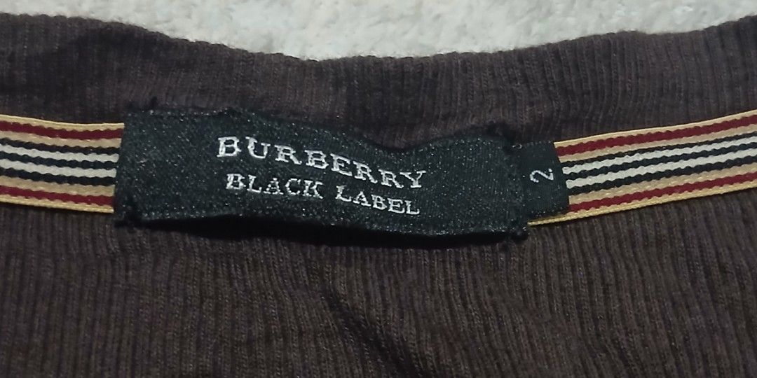 Burberry tank tops (Category: Others Tops) located in Iriga City. Submitted by newbear-a710 (Listing ID 1466276350, Image 2). Description: Excellent Condition Color Rate 9.5/10 Need wash.