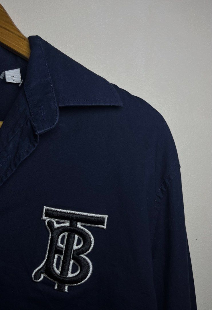 BURBERRY TB EMBROID POLO LONG SLEEVE (Category: Tshirts & Polo Shirts ) located in Marikina City. Submitted by chasecollectives (Listing ID 1466307610, Image 2). Description: BRAND : BURBERRY TB POLO LONG SLEEVE *PERFECT FOR YOUR CASUAL WEAR AND MEETING / APPOINTMENTS) EXCELLENT CONDITION *GANDA NETO!* SIZE : XL WIDTH - 24 LENGTH - 28 * 30 NO ISSUE.