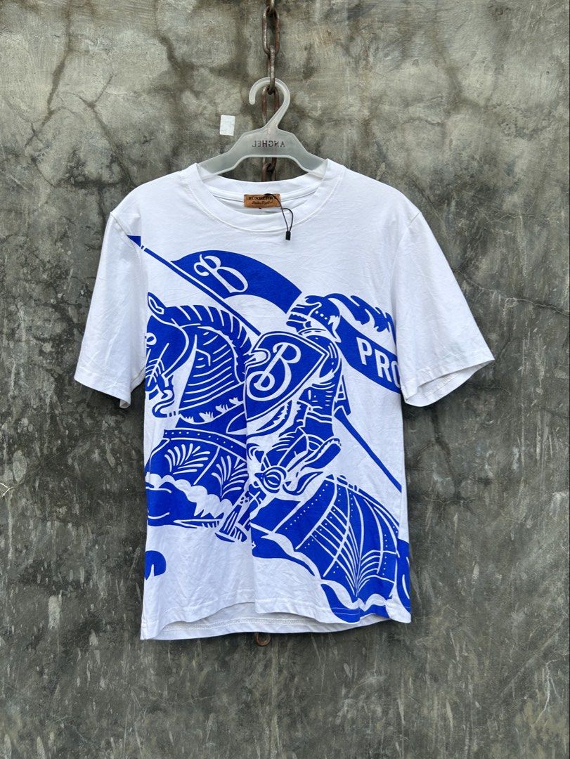 Burberry Tee For HER (Category: Shirts) located in Tuguegarao City. Submitted by 2giefinds (Listing ID 1466251099, Image 1). Description: Size: MEDIUM (WOMEN) Dimes: W:18 x L:25 Condition: Excellent Color Rate: 10/10 Issue: ❌.