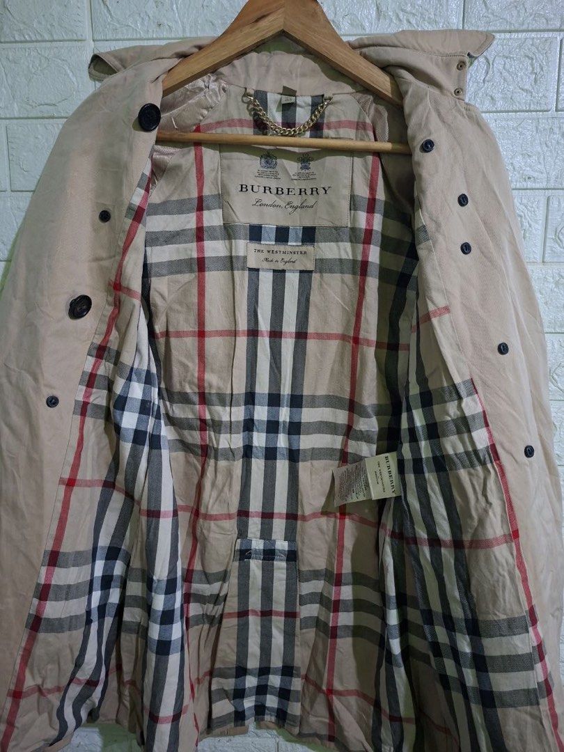 Burberry Trench Coat (Category: Coats, Jackets and Outerwear) located in Bulacan. Submitted by bleue.finds (Listing ID 1466298502, Image 3). Description: Burberry Trench Coat’s Jacket 18 - Width 30.5 - Length issue : missing 1 button sa pocket, and stains check last 2 pictures .