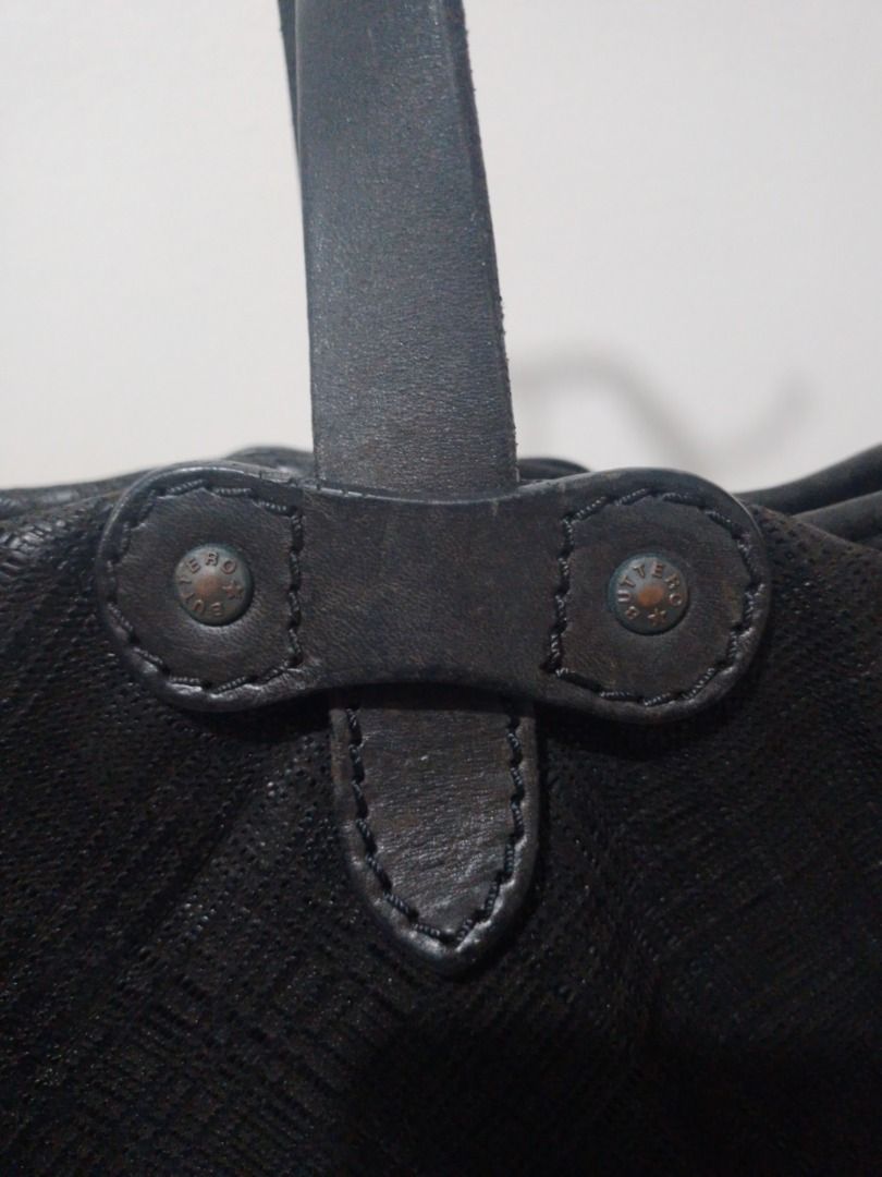RUSH SALE! Buttero Black Leather Tote Bag (Category: Tote Bags) located in Imus. Submitted by bestfinds_yeth0724 (Listing ID 1466327924, Image 3). Description: Authentic Buttero leather tote bsg Issue ;nilabhan ko ang inner lining nya kasi madumi ang nabura yung brand name sa patch kaya nka sale pero nka engrave sa hardware ang brand.. MOP gcash Location Imus Cavite.
