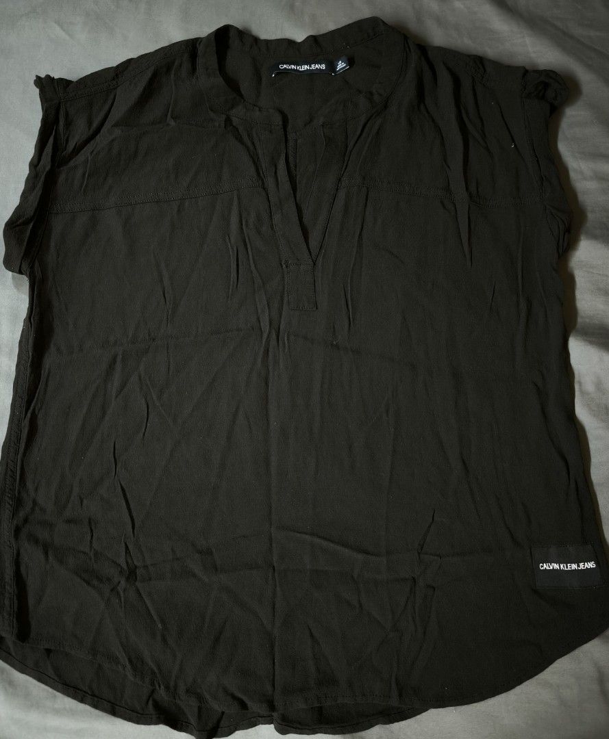 Calvin Klein blouse (Category: Blouses) located in Manila. Submitted by wearforce (Listing ID 1466301490, Image 2). Description: Calvin Klein blouse brand: Calvin Klein in good condition can fit: M-L rate color 10/10 349 + sf.