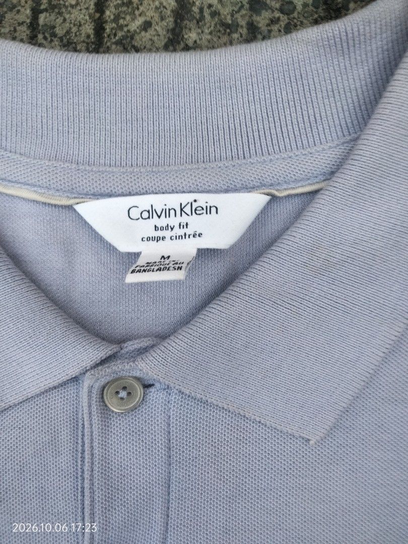Calvin Klein Polo Shirt (Category: Tshirts & Polo Shirts ) located in Caloocan City. Submitted by haruconcep52476 (Listing ID 1466314021, Image 3). Description: Dimensions W20×L28 Good condition Color rate 9 Issue need wash.