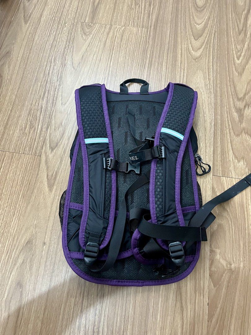CAMEL CROWN 18L Hiking Backpack Black Purple (Category: Hiking & Camping) located in Makati City. Submitted by angel64119 (Listing ID 1466214945, Image 2). Description: Camel Crown 18L Hiking Backpack Original price: 1,072 php Never used RFS: Mas prefer mag light pack - Brand: CAMEL CROWN - Color: Black with stylish purple trim - Compact Dimensions: 45cm x 28cm x 14cm - Storage: Mesh side pockets and front bungee cord storage - Comfort: Padded sh