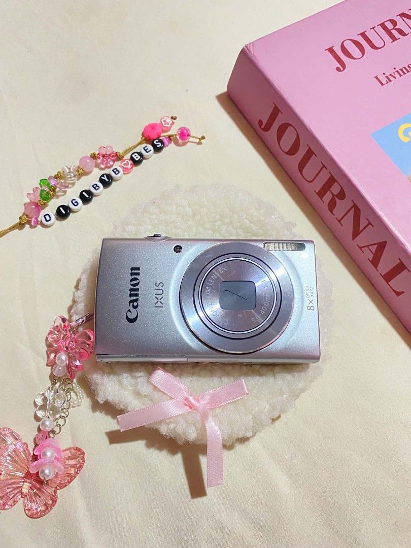 CANON IXUS 145 DIGITAL CAMERA DIGICAM (Category: Cameras) located in Manila. Submitted by jade_snap (Listing ID 1466304592, Image 1). Description: ✧⁠* CANON IXUS 145 - sharp outputs ♡ ₱4,499 READY TO USE lcd leak (doesn't affect the output) 🩰Specs: *.' 16 MP *.' 8x optical zoom *.' ISO 80 to 1600 *.' CCD sensor 🎞️ Condition: ७९ all buttons are working, zoom, and flash ७९ body condition: 9/10 ७९ no port cover 👛 Ready to use! ७९ Inclusions - uni