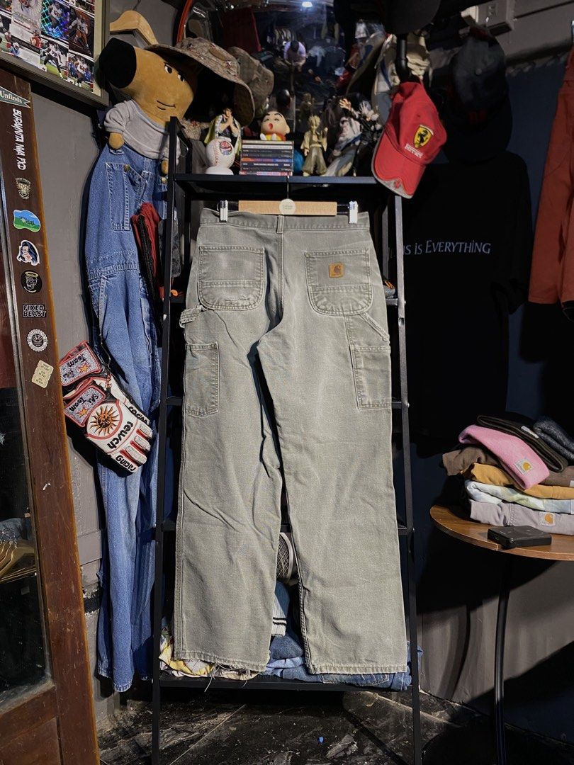 CARHARTT 2022 B11 MOS (Category: Jeans) located in San Pablo. Submitted by genesisllo24149 (Listing ID 1466187509, Image 2). Description: CARHARTT 2022 B11 MOS WAIST -> 31 LENGTH -> 40 THIGH -> 13 LEG OPENING -> 8.5 ISSUE -> DISTRESSED CONDITION -> GOOD DM TO PURCHASE 📥 DISCLAIMER: - Please manage your expectations, posted items are preloved, used & thrifted -Actual color may vary due to lighting -Flaker will be posted.