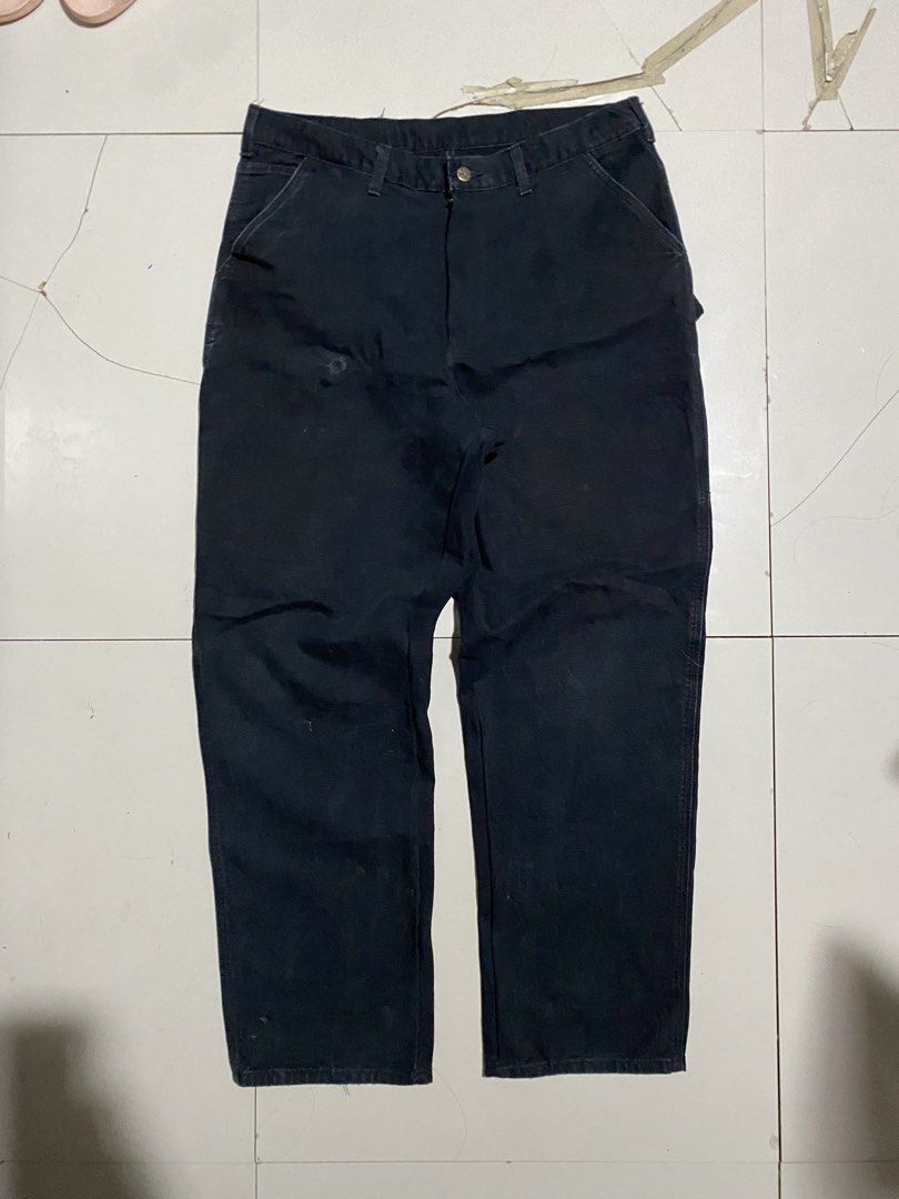 Carhartt Black Canvas Carpenter Work Pants (Category: Jeans) located in Antipolo. Submitted by cogiestamaria (Listing ID 1466263810, Image 2). Description: - Brand: Carhartt - Style: Double Knee Carpenter Pants - size 36-38 - Length 44 - Leg Opening 9.5 - no issue - color rate 9-10 - excellent condition - Color: Faded Black - Material: Heavy-duty cotton duck canvas - Features: Hammer loop, tool pockets, reinforced double knees - Condition: Faded 
