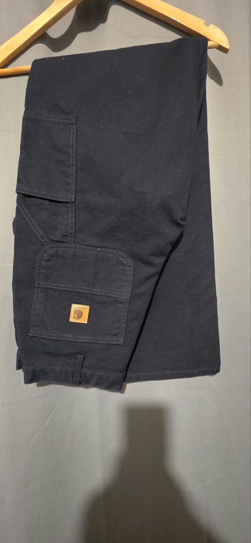 Carhartt B11 MDT (Category: Jeans) located in Makati City. Submitted by carlju (Listing ID 1466329027, Image 2). Description: - Brand: Carhartt B11 MDT - Style: Loose Fit Washed Duck Utility Work Pant / Carpenter Style - Color: MDT - Size: 34x46x9.5 - Condition: Brand new with original yellow store tags attached - Material: Durable duck canvas - Features: Multiple utility pockets, hammer loop, straight leg cut, and iconic logo patch on back pocke
