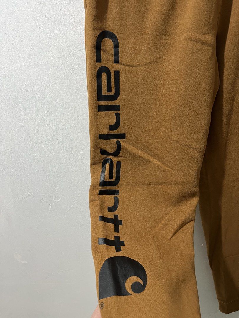 Carhartt Script Sweatpants BRN BN8429-B - Large (14-16) (Category: Babies & Kids Fashion) located in Malaybalay. Submitted by tapiocasthrift (Listing ID 1466194201, Image 2). Description: Size: Large (14-16) Dimes: 26 waist (stretchable) x 39.5 length HEM: 5 Thigh: 10 Color rate: 9.5/10 Excellent condition No Issue.