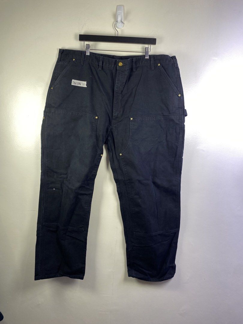 Carousell Carhartt Double Knee Work Pants Black (Category: Jeans) located in Manila. Submitted by declutterpromax (Listing ID 1466231653, Image 1). Description: - Brand/Model: Carhartt Double Knee Work Pants - Color: Classic Black - Material: Heavy-duty duck canvas - Fit: Wide leg, utility style - Features: Double front panels for extra durability, zip fly with brass button closure - Condition: Normal signs of wear on hems and fabric - Perfect fo