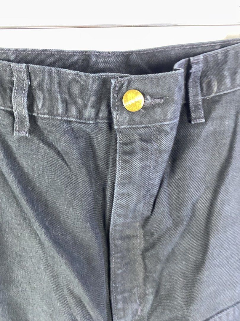 Carousell Carhartt Double Knee Work Pants Black (Category: Jeans) located in Manila. Submitted by declutterpromax (Listing ID 1466231653, Image 2). Description: - Brand/Model: Carhartt Double Knee Work Pants - Color: Classic Black - Material: Heavy-duty duck canvas - Fit: Wide leg, utility style - Features: Double front panels for extra durability, zip fly with brass button closure - Condition: Normal signs of wear on hems and fabric - Perfect fo