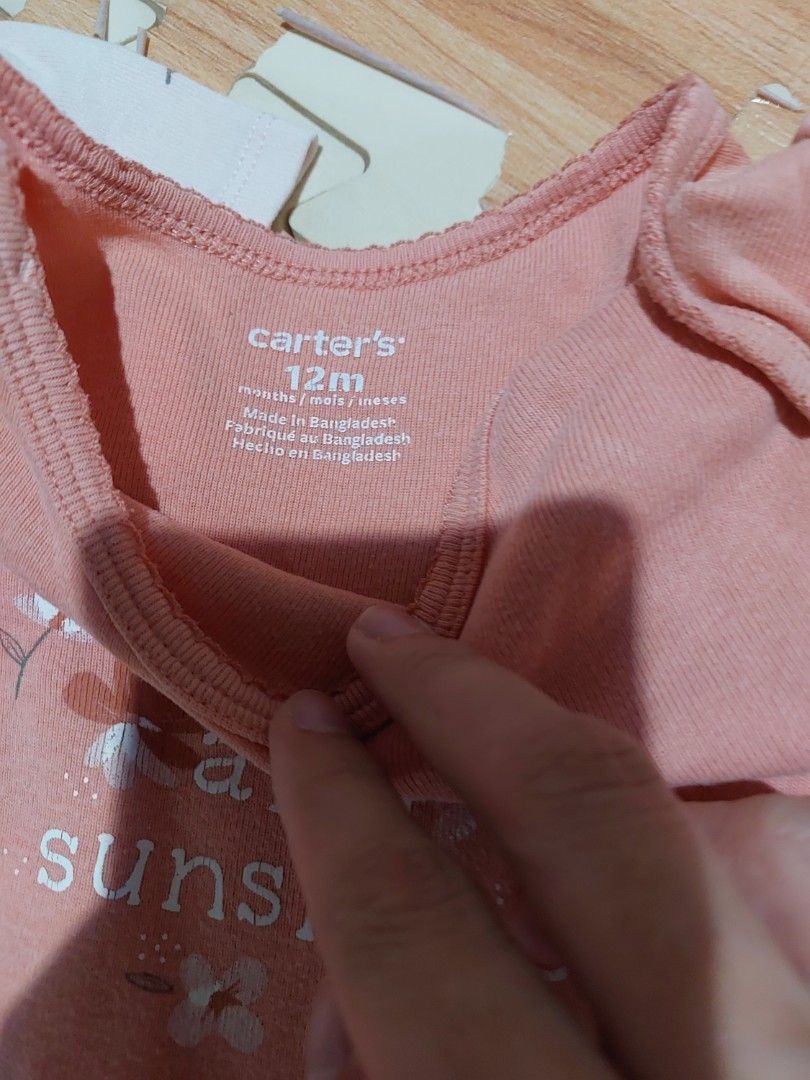 Carters Onesies (Category: Babies & Kids Fashion) located in Makati City. Submitted by monicaelise (Listing ID 1466316272, Image 2). Description: like new fits 12 months old.