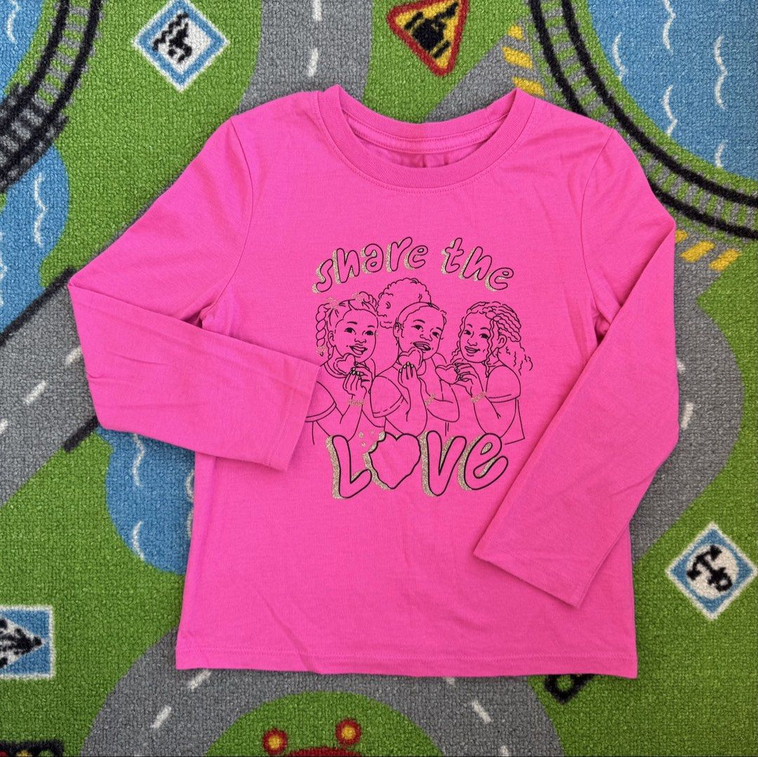 Cat & Jack Long Sleeve T-Shirt (Category: Babies & Kids Fashion) located in Rizal. Submitted by preloovved (Listing ID 1466267261, Image 1). Description: Bright pink long sleeve t-shirt with a cute 'Share the Love' glitter graphic and three girls on the front. Features a comfy crew neckline and relaxed fit in soft, everyday cotton. Perfect for casual wear! Preloved, 5yo Meet-up only in GB1 San Mateo, Rizal Shipping fee c/o buyer. Tres Marias or J