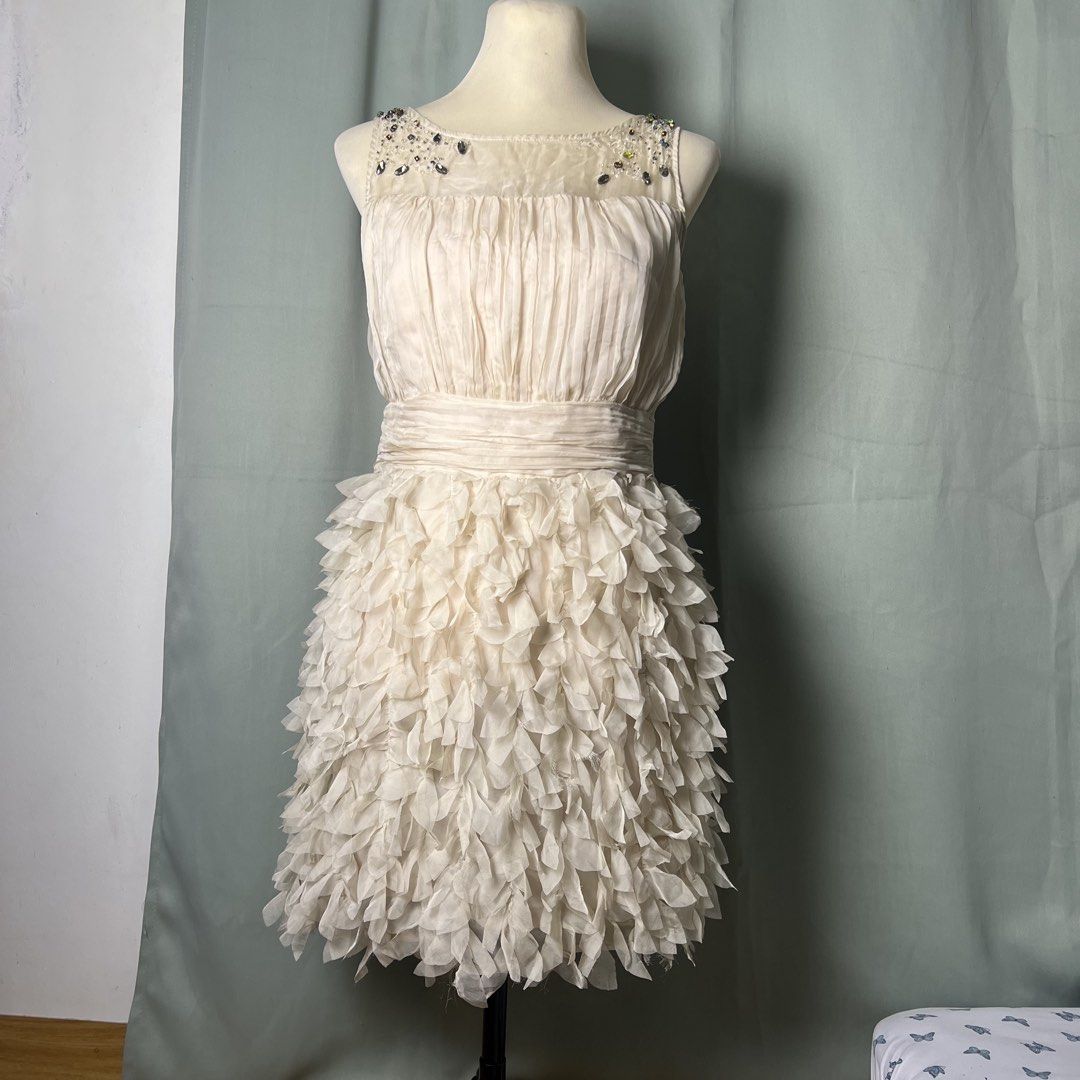 cciguni silk party dress (Category: Dresses) located in Malabon City. Submitted by minidressmonster (Listing ID 1466233605, Image 3). Description: cciguni beige 100% silk ruffled party formal birthday dress very gossip girl haha side zip and has inner lining needs wash, a little dusty due to storage best fit small to medium dimensions bust: 32 in waist: 28 in length: 29 in.