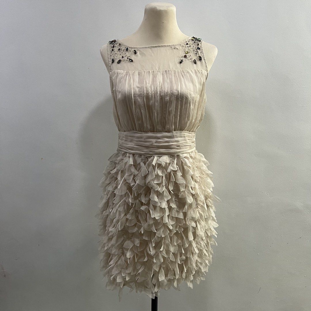 cciguni silk party dress (Category: Dresses) located in Malabon City. Submitted by minidressmonster (Listing ID 1466233605, Image 1). Description: cciguni beige 100% silk ruffled party formal birthday dress very gossip girl haha side zip and has inner lining needs wash, a little dusty due to storage best fit small to medium dimensions bust: 32 in waist: 28 in length: 29 in.