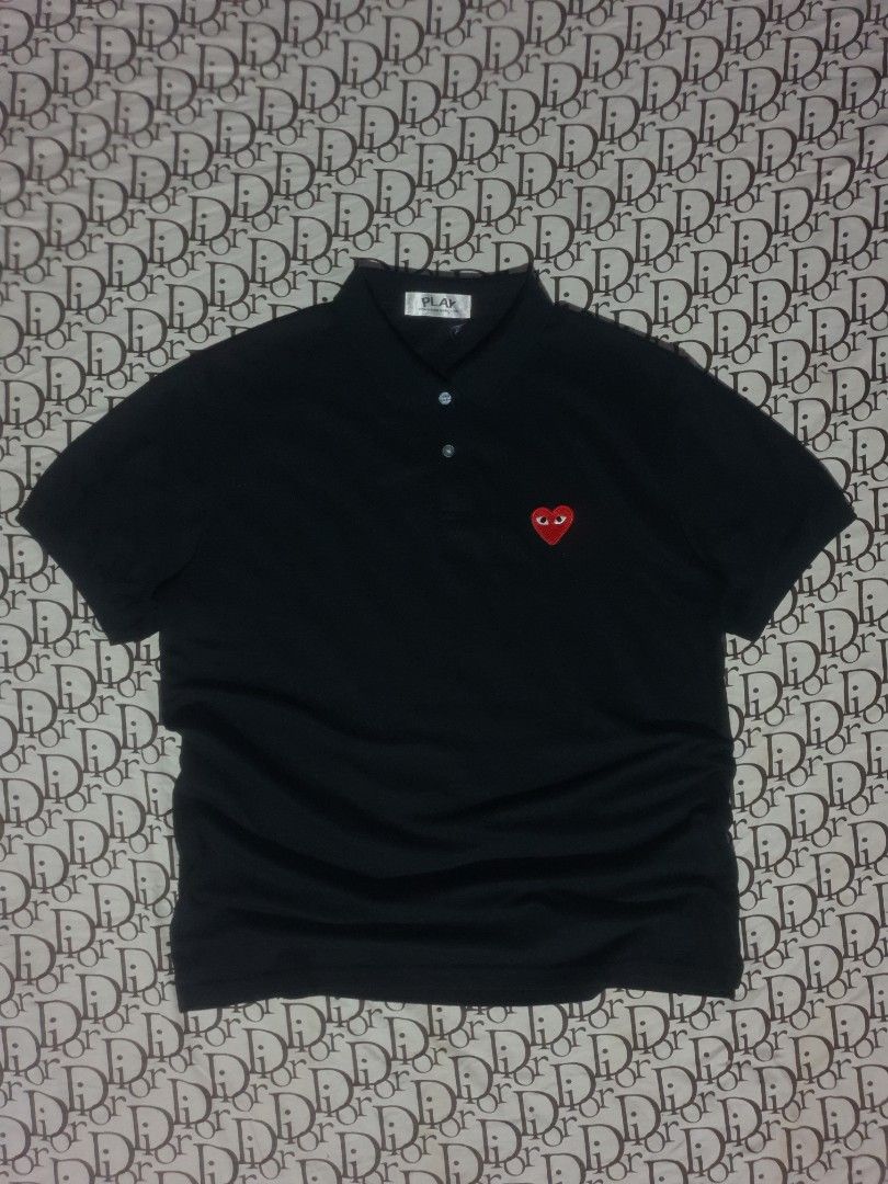 CDG Play black poloshirt (Category: Tshirts & Polo Shirts ) located in San Fernando. Submitted by retro.district. (Listing ID 1466271840, Image 1). Description: - CDG Play black poloshirt - Size: XL (23x29) - Condition: Excellent - Issue missing washtag - Color Rate: 9.5/10.