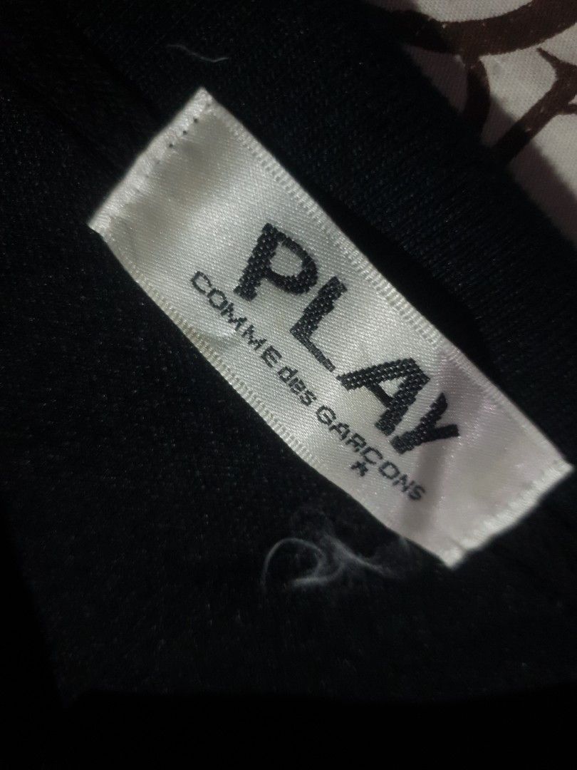 CDG Play black poloshirt (Category: Tshirts & Polo Shirts ) located in San Fernando. Submitted by retro.district. (Listing ID 1466271840, Image 3). Description: - CDG Play black poloshirt - Size: XL (23x29) - Condition: Excellent - Issue missing washtag - Color Rate: 9.5/10.
