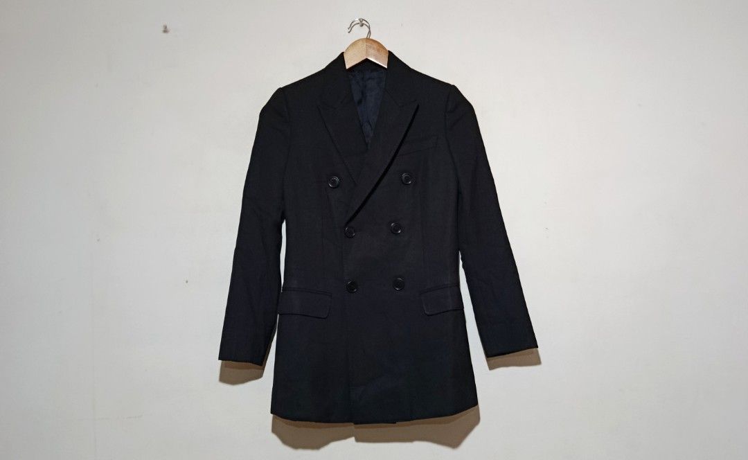 Celine - Double-Breasted Black Blazer (Category: Luxury Apparel) located in San Fernando. Submitted by son.twice.stuff (Listing ID 1466290032, Image 1). Description: Item: Celine - Double-Breasted Black Blazer Tagged Size: 34 Fit Small Dimensions Length: 29" Width: 16.5" Shoulder: 13" Sleeve: 21" Condition: Excellent Made In Italy Material 100% Wool Lining 54% Cupro 46% Viscose Price: 8800 Free Shipping.