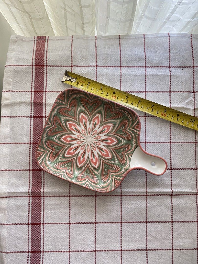 Ceramic Square Serving Dish with Handle Pink Green Floral (Category: Dinnerware & Cutlery) located in Mandaluyong City. Submitted by lovegood711 (Listing ID 1466160078, Image 2). Description: Square, ceramic serving dish with pretty pink and green floral marbling pattern. Handy handle with hole for hanging or easy grip. Measures around 8 inches across. Deep edges to keep food contained. Great for serving snacks, side dishes, your morning sandwich