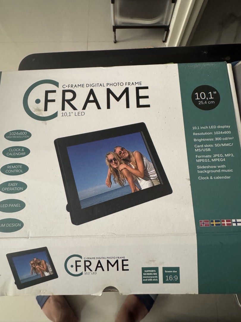 C-Frame 10.1" LED Digital Photo Frame with Remote Control (Category: Frames & Pictures) located in Cavite. Submitted by marcuz1316 (Listing ID 1466253015, Image 1). Description: - 10.1" LED screen with 1024x600 high resolution (16:9 aspect ratio) - Includes remote control (still in original plastic wrap) and original box - Supports SD, MMC, MS memory cards and USB flash drives - Plays JPEG photos, MP3 music, MPEG1, and MPEG4 videos - Features sli