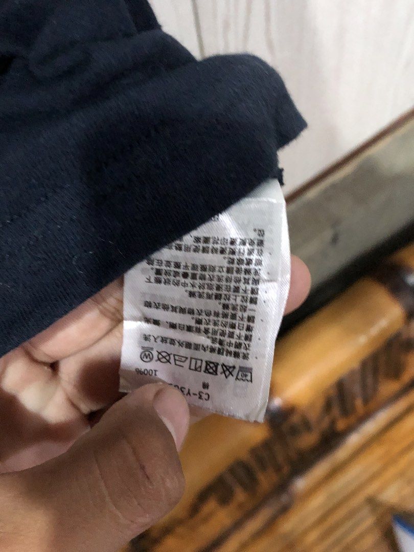 Champion Curved Logo Tee Dark Blue Large (Category: Shirts) located in Magsaysay. Submitted by ryns_thrifting (Listing ID 1466260854, Image 3). Description: - Brand: Champion - Color: Dark Navy Blue - Size: Large - Material: 100% Cotton - Details: Distressed arch logo on chest, embroidered C logo on sleeve - Fit: Standard crewneck - Condition: Classic casual streetwear, easy to style.