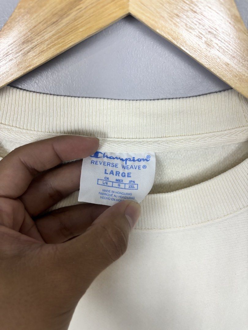 Champion Reverse Weave Cream Sweatshirt Size Large (Category: Coats, Jackets and Outerwear) located in Mabalacat. Submitted by doughnutthrift (Listing ID 1466193369, Image 2). Description: CHAMPION REVERSE WEAVE CREWNECK SWEATSHIRT Excellent condition W- 23” L- 29” No issues .