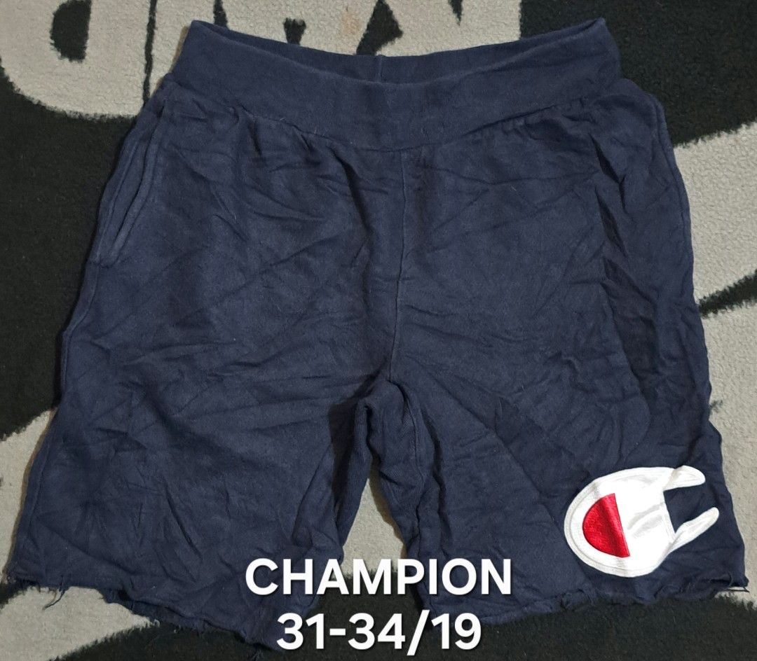 Champion Reverse Weave Navy Shorts Size M (Category: Shorts) located in San Fernando, Camarines Sur. Submitted by ladderaya (Listing ID 1466229772, Image 1). Description: - Brand: Champion Reverse Weave - Size: Medium (tag attached) - Color: Navy - Material: Soft cotton blend - Origin: Made in El Salvador - Features: Big embroidered logo patch on lower left leg, drawstring waistband, and side pockets - Condition: Brand new with tags, great casual