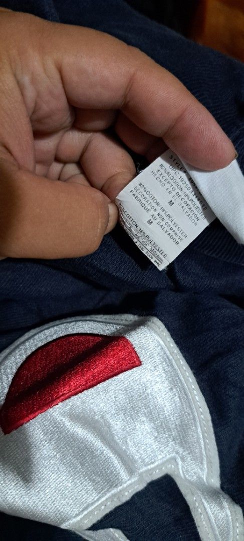 Champion Reverse Weave Navy Shorts Size M (Category: Shorts) located in San Fernando, Camarines Sur. Submitted by ladderaya (Listing ID 1466229772, Image 3). Description: - Brand: Champion Reverse Weave - Size: Medium (tag attached) - Color: Navy - Material: Soft cotton blend - Origin: Made in El Salvador - Features: Big embroidered logo patch on lower left leg, drawstring waistband, and side pockets - Condition: Brand new with tags, great casual