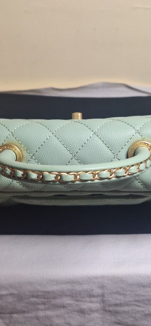 Chanel Caviar Quilted Handle Flap Bag (Category: Luxury Bags & Wallets) located in Manila. Submitted by melods05 (Listing ID 1466332732, Image 3). Description: - Brand: Chanel - Style: Handle Flap Bag - Material: Caviar Leather - Color: Light Sage Green (Pastel) - Hardware: Light Gold - Closure: Classic CC Twist Lock - Features: Quilted pattern, sturdy structured top handle, structured silhouette - Condition: Excellent/Pristine - Perfect for: Dai