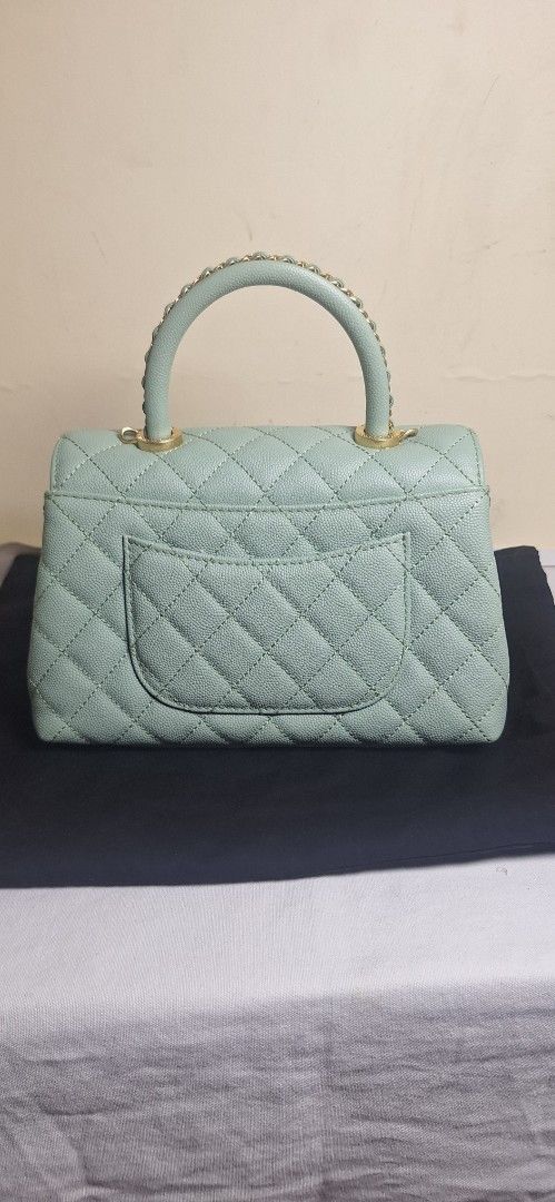 Chanel Caviar Quilted Handle Flap Bag (Category: Luxury Bags & Wallets) located in Manila. Submitted by melods05 (Listing ID 1466332732, Image 2). Description: - Brand: Chanel - Style: Handle Flap Bag - Material: Caviar Leather - Color: Light Sage Green (Pastel) - Hardware: Light Gold - Closure: Classic CC Twist Lock - Features: Quilted pattern, sturdy structured top handle, structured silhouette - Condition: Excellent/Pristine - Perfect for: Dai